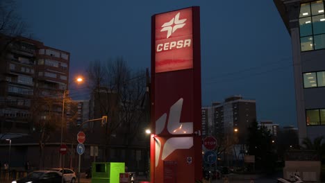 Cepsa,-the-Spanish-multinational-oil-and-gas-company,-gas-station,-and-logo-seen-during-nighttime-in-Spain