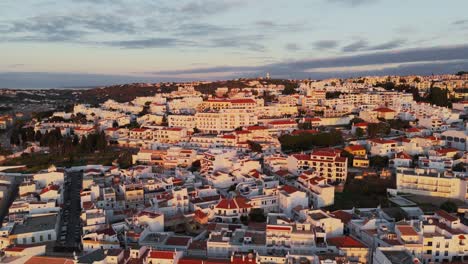 Panoramic-Aerial-View-Of-Historic-Town-With-Red-Tiled-Roof-Houses-In-Lisbon,-Portugal