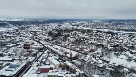 Buildings-and-houses-covered-in-winter-snow,-Kaunas-Lithuania