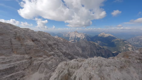 Freestyle-drone-flight-over-high-rocky-peaks-of-Dolomites-Mountain-range