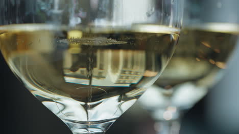 Closeup-shot-of-champagne-degustation-at-a-French-restaurant-with-blurred-background