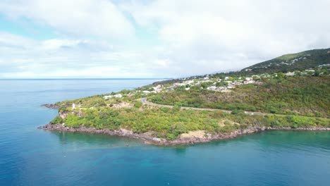 Iconic-township-on-coastline-of-Guadeloupe-island,-aerial-view