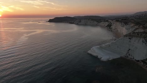 Sunset-Glow-on-Scala-dei-Turchi's-White-Cliffs,-Sicily-Italy---Aerial