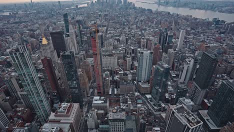 High-angle-panoramic-cityscape-view-over-New-York-skyline-at-sunset