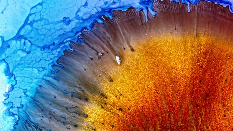 Macro-shot-of-vibrant-blue-and-red-ink-diffusing-in-water,-creating-an-abstract,-coral-like-pattern