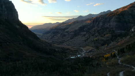 Telluride-Colorado-aerial-drone-4wd-off-roading-historic-town-scenic-landscape-autumn-golden-yellow-Aspen-trees-sunset-Rocky-Mountains-Silverton-Ouray-Millon-Dollar-Highway-slowly-forward-motion