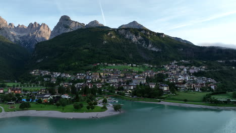 Molveno-city-along-lake-shores,-Trentino-in-Italy