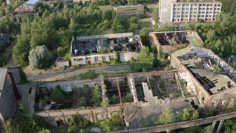 Aerial-shot-of-abandoned-destroyed-industrial-buildings-in-Bratislava,-Slovakia