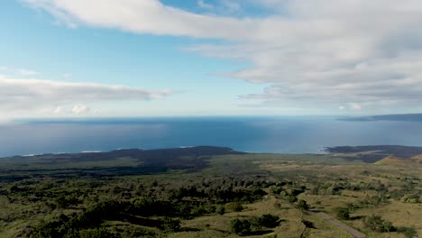 Wide-rising-aerial-of-Kanaio-Natural-Area-Reserve-and-open-sea,-Hawaii