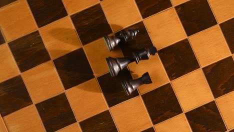 Continuous-shot-of-black-chess-set,-rook,-bishop-and-king