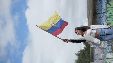 Vertical-video-patriotic-woman-from-Latin-America-holding-Ecuador-flag