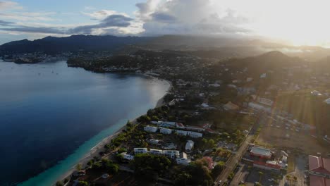 Sunset-on-Caribbean-beach-in-Grenada,-aerial-establisher
