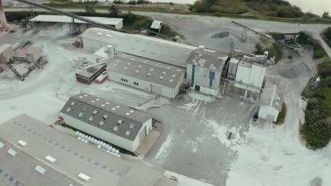 Industrial-building-and-equipment-seen-from-drone