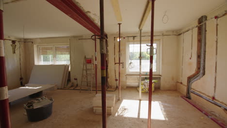 tracking-shot-on-private-construction-site,-entering-a-beautiful-room-with-huge-south-facing-window