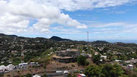 Aerial-orbit-establishes-historic-Fort-Frederick-in-Grenada-under-blue-sky-with-clouds