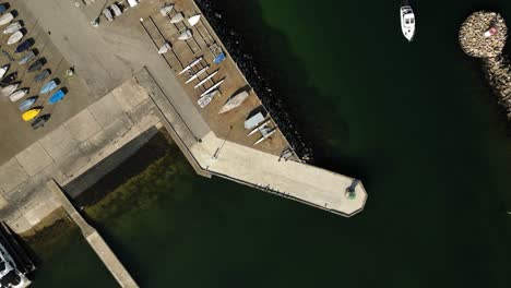Drone-footage-of-the-pier-at-Egå-Marina,-Kaløvig-boat-association