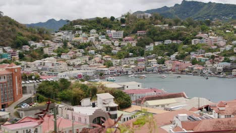 Colorful-houses-in-a-bay-on-Caribbean-island,-St-Georges-old-town-in-Grenada