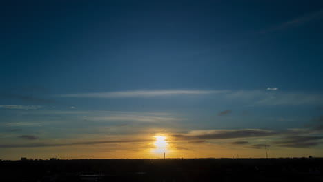 Timelapse-of-sunrise-with-clouds-passing-over-suburban-area
