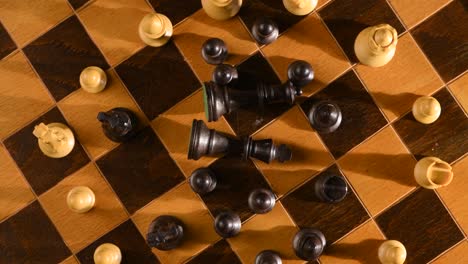 Both-king-and-the-queen-are-defeated,-left-of-chess-war-on-chessboard