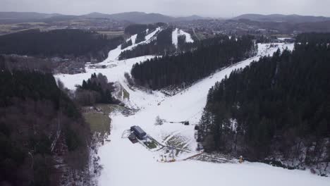 Very-few-people-skiing-on-the-slope-in-Winterberg-due-to-bad-weather
