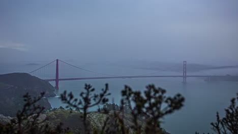Golden-Gate-bridge-soaked-in-misty-fog,-gloomy-day-in-California,-USA