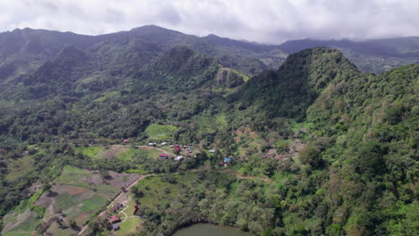 The-lush-san-carlos-landscape-with-green-mountains-and-small-community,-daylight,-aerial-view