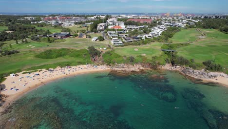Aerial-View-Of-Little-Bay-Beach-And-Eastern-Suburbs-In-Sydney,-New-South-Wales,-Australia---Drone-Shot