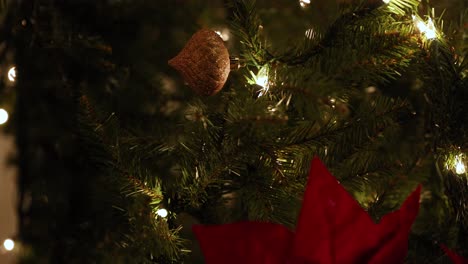 Vertical-Shot-Of-Christmas-Tree-With-Hanging-Decorations---Close-Up