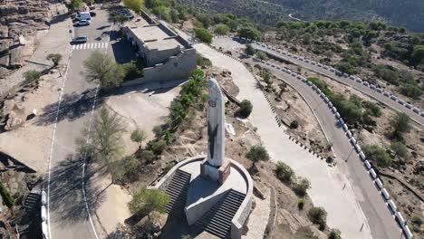 Large-statue-of-the-Virgin-Mary-on-Mount-Cerro-del-Cabeza-Sierra-Morena-Spain-AERIAL