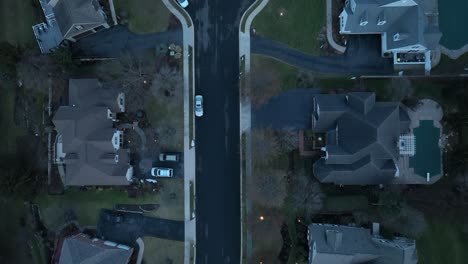 Aerial-top-down-shot-of-luxury-american-neighborhood-with-private-street-and-cul-de-sac