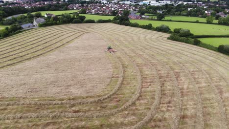 Tractor-Harvesting-Hay-On-Farmland-In-East-Devon