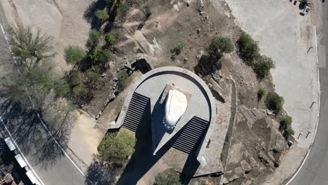 Aerial-top-down-and-rotate-over-the-Holy-Madonna-statue-on-Mount-Cerro-Spain