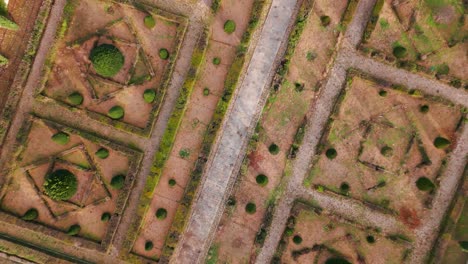 Aerial-spiral-shot-of-the-gardens-at-the-departmental-area-of-Restinclieres