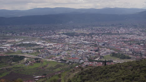 Looking-down-at-a-landscape-of-a-city-and-mountains-in-Pergamum