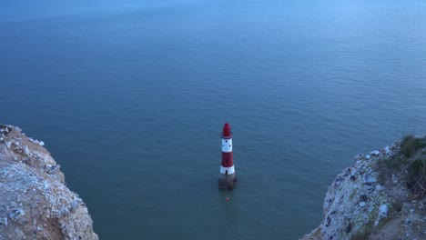 Red-and-White-Lighthouse-by-Chalk-Cliff
