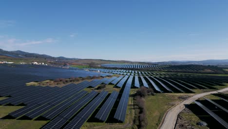 Expansive-Solar-Farm-Amidst-Portuguese-Landscape---aerial-fly-over