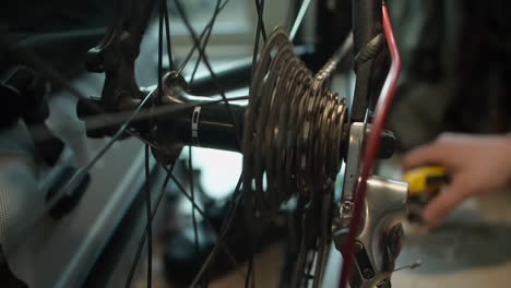 Close-up:-After-adjusting-shifters,-bicycle-chain-spins-rear-sprocket