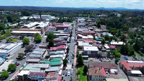 Aerial-drone-of-main-town-centre-Katoomba-CBD-shops-housing-cars-on-road-streets-infrastructure-Blue-Mountains-NSW-Australia