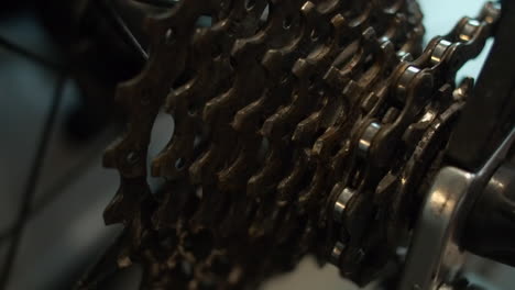 Extreme-close-up:-Bicycle-rear-sprocket-cassette-spins-during-service