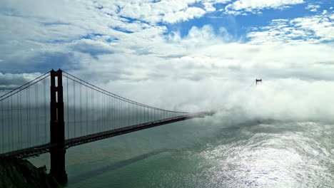 Golden-Gate-Bridge-shrouded-in-billowing-fog-in-San-Francisco,-California,-USA