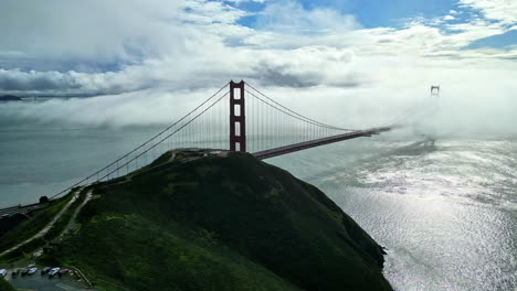 Breathtaking-scene-as-Golden-Gate-Bridge-pierces-through-clouds-on-a-misty-day