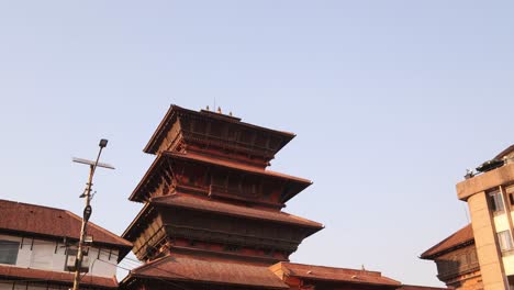tall-pagoda-style-temples-in-durbar-square-In-Kathmandu,-Nepal-at-the-base-of-the-Himalayas