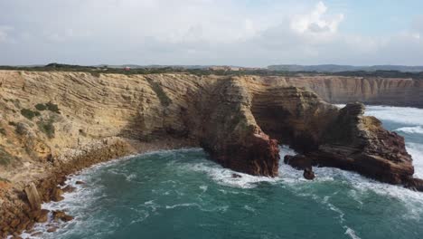 Drone-shot-of-a-Portuguese-landscape,-in-Carapateira,-Algarve
