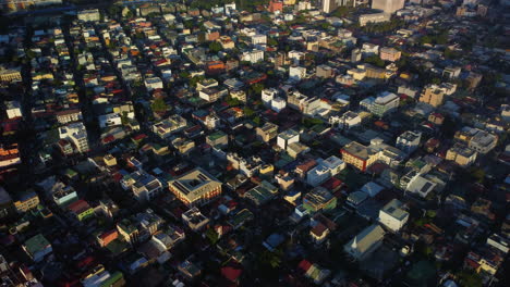 Drone-shot-overlooking-a-wealthy-neighborhood-in-Makati-city,-Manila,-Philippines