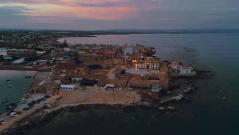 Marzamemi,-old-fishing-village-in-Sicily-by-sunset