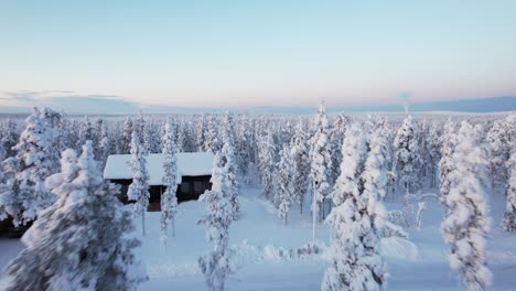 Drone-Flys-Over-Small-Village-In-Lapland,-Finland,-Arctic-Circle
