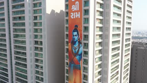 Rajkot-Aerial-Drone-View-A-big-Jai-Shree-Ram-banner-is-visible-and-there-are-big-buildings-around