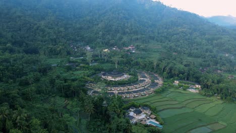 Aerial-view-of-Amanjiwo-Premium-Hotel-with-mountain-forest-in-the-background-in-the-morning
