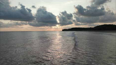 Flying-low-along-the-Costa-Rica-shore-during-sunset