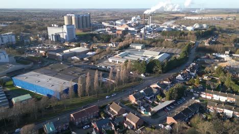Bury-st-edmunds-showcasing-industrial-and-residential-areas-in-daylight,-aerial-view